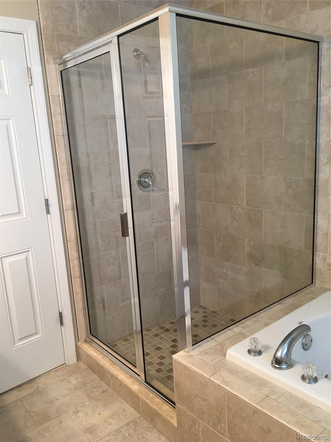16510 Moore Park Road Macomb, MI 48044 - Photo 28 of 38 Master shower stall.JPG