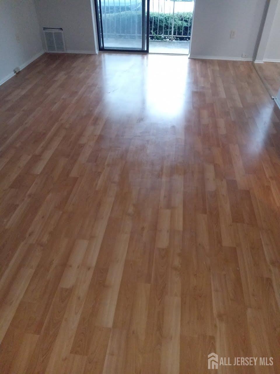 1503 Raspberry Court Edison, NJ 08817 - Photo 4 of 9 a view of hallway with wooden floor