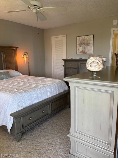 413 Augusta Boulevard, Unit 306 Naples, FL 34113 - Photo 18 of 31 a bedroom with a bed and painting on the wall