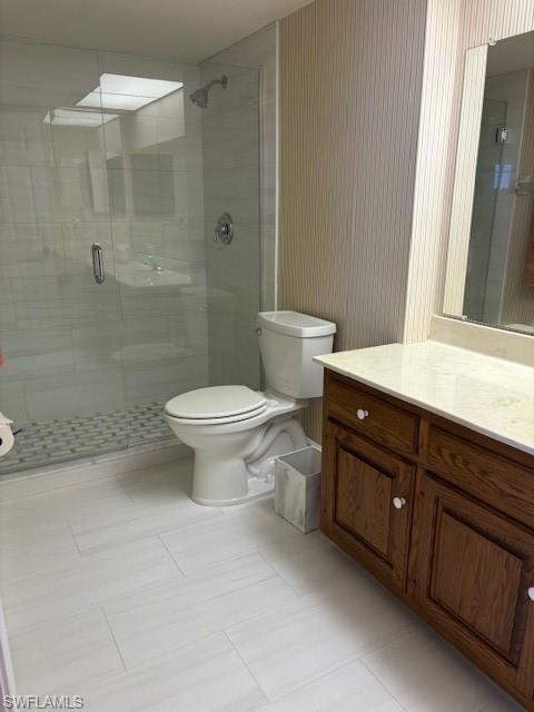 413 Augusta Boulevard, Unit 306 Naples, FL 34113 - Photo 19 of 31 a bathroom with a sink toilet and shower
