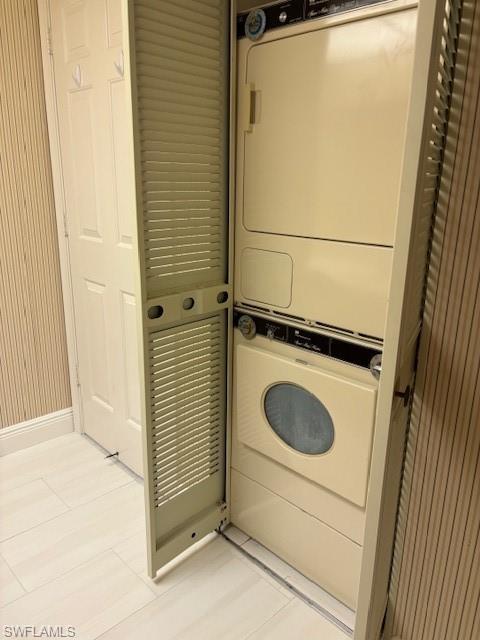 413 Augusta Boulevard, Unit 306 Naples, FL 34113 - Photo 22 of 31 a utility room with dryer and washer