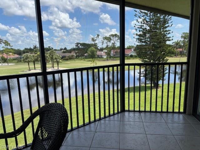 413 Augusta Boulevard, Unit 306 Naples, FL 34113 - Photo 24 of 31 a balcony with street view