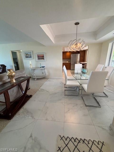 413 Augusta Boulevard, Unit 306 Naples, FL 34113 - Photo 10 of 31 a living room with furniture and a table