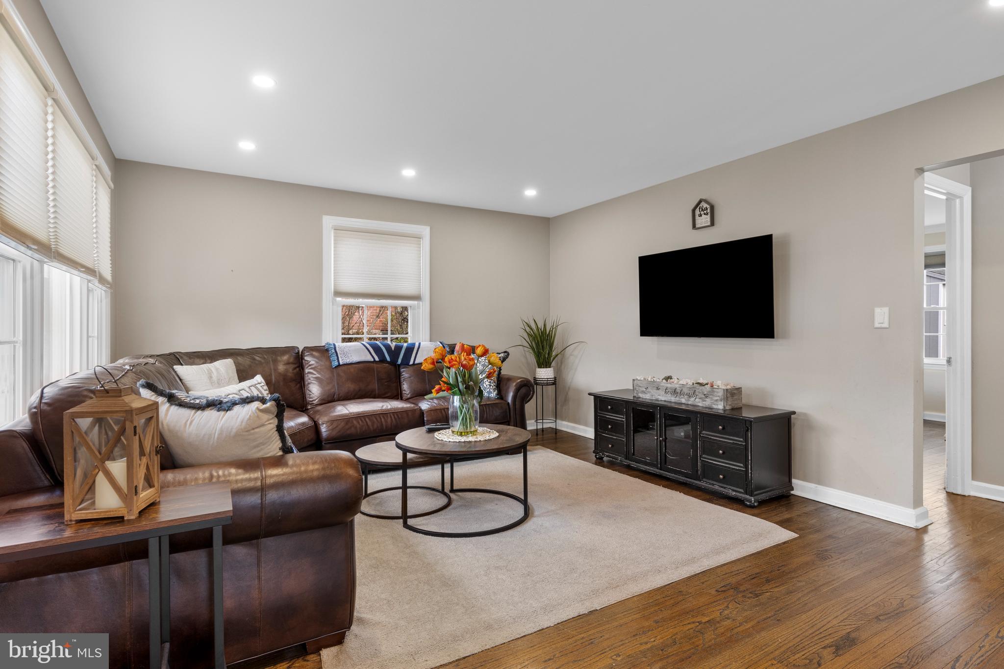 409 Paddock Road Havertown, PA 19083 - Photo 14 of 47 a living room with furniture and a flat screen tv