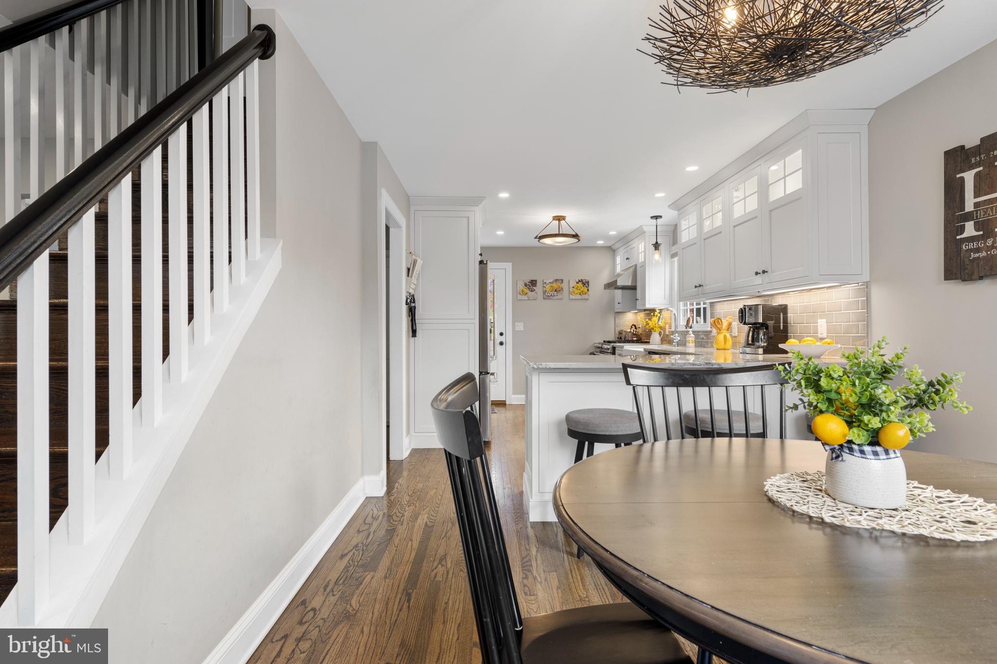 409 Paddock Road Havertown, PA 19083 - Photo 21 of 47 a dining room with furniture and wooden floor