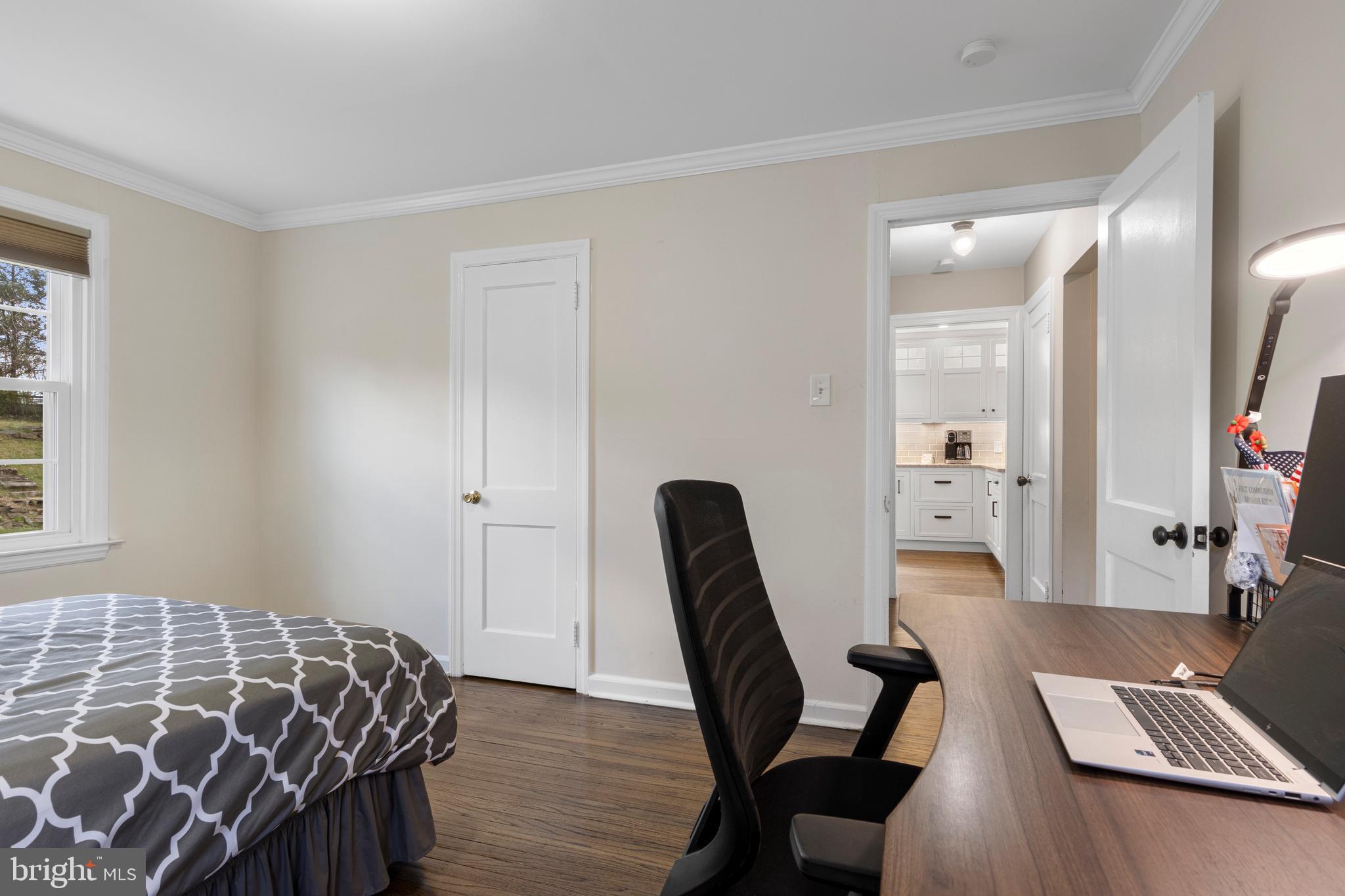 409 Paddock Road Havertown, PA 19083 - Photo 33 of 47 a bedroom with a bed and a chair