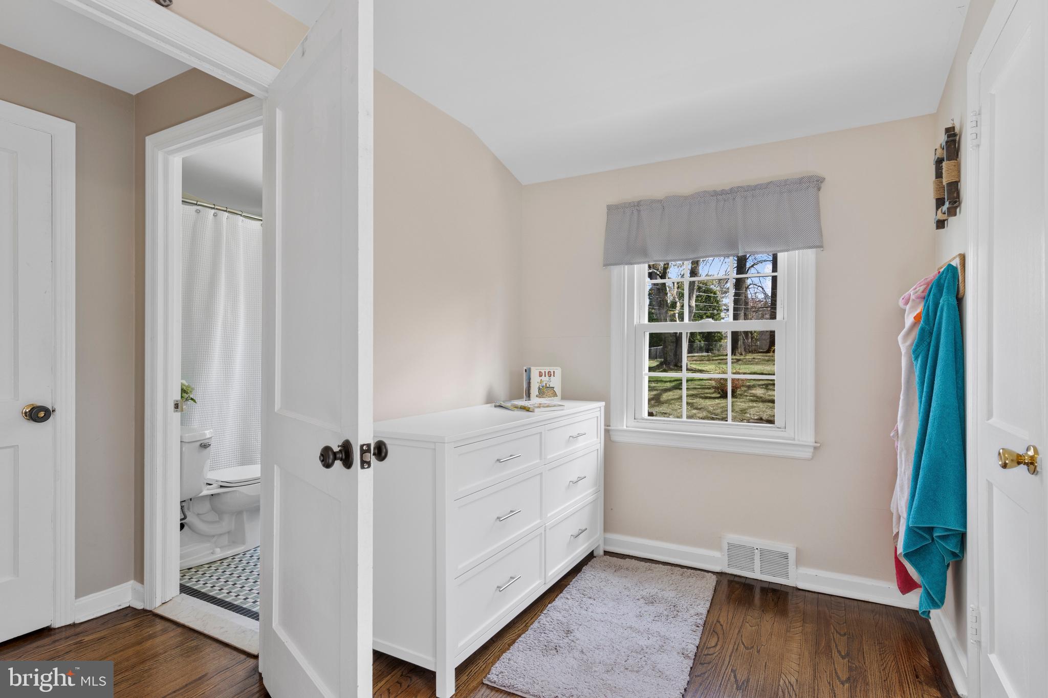 409 Paddock Road Havertown, PA 19083 - Photo 47 of 47 a view of an empty room with wooden floor and a window