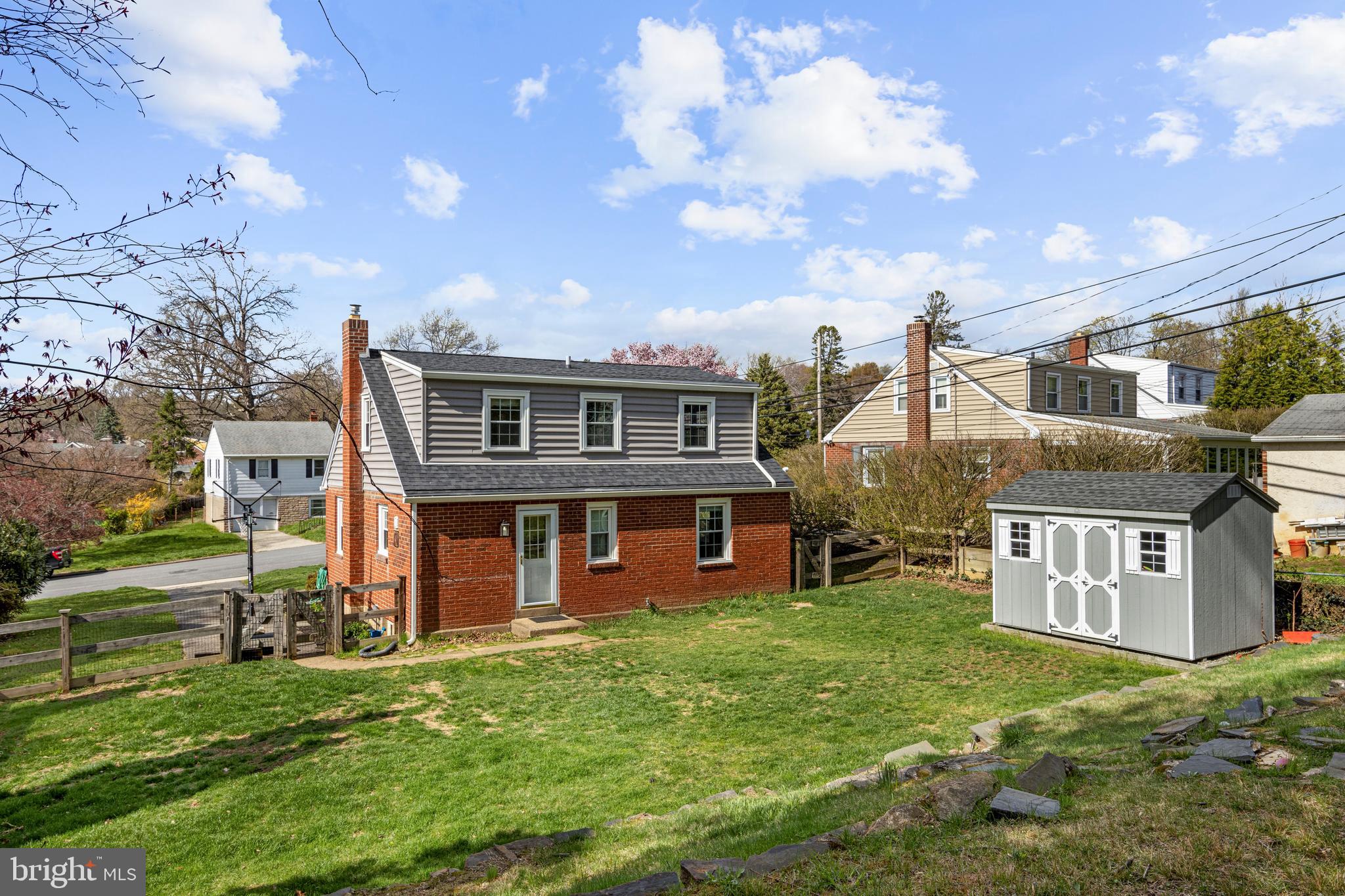 409 Paddock Road Havertown, PA 19083 - Photo 10 of 47 a view of a house with a yard