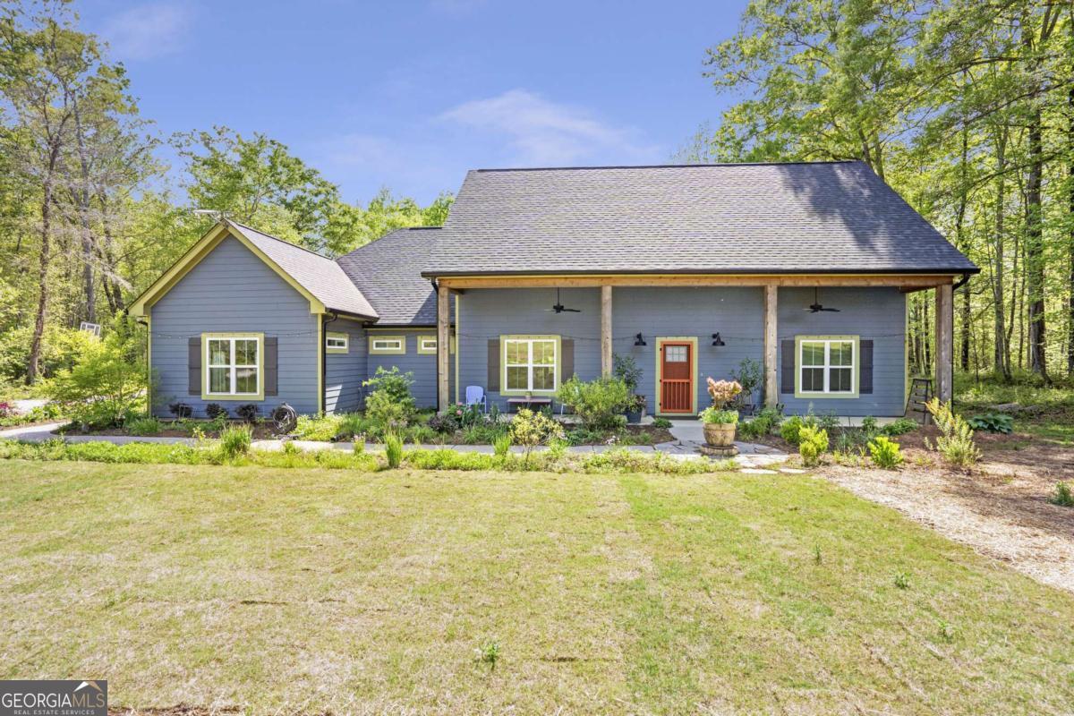225 Hamrick Road Bremen, GA 30110 - Photo 1 of 1 a front view of a house with a yard