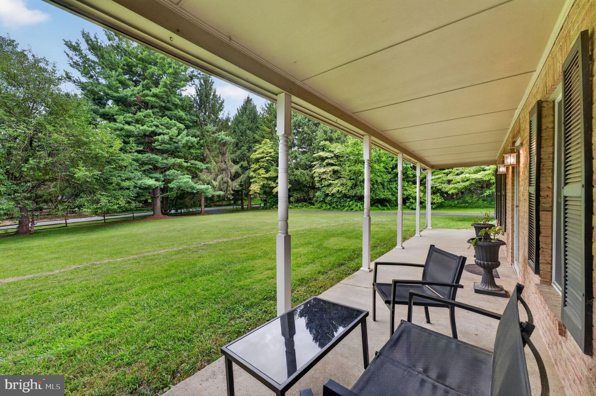 20210 Bent Willow Road Rohrersville, MD 21779 - Photo 6 of 98 Serene porch with lush green views.