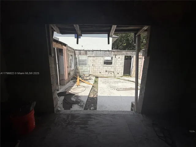 a view of a backyard of the house