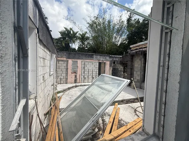 a view of backyard of house