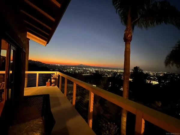 a view of a balcony with an ocean view