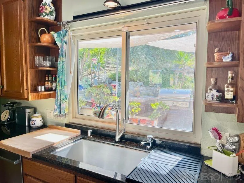 5346 Grandridge Road El Cajon, CA 92020 - Photo 29 of 50 a room with furniture and a window