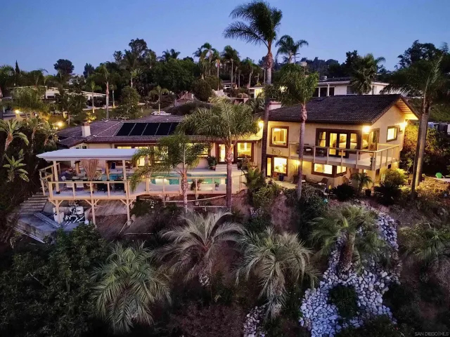 a picture of houses with lots of trees