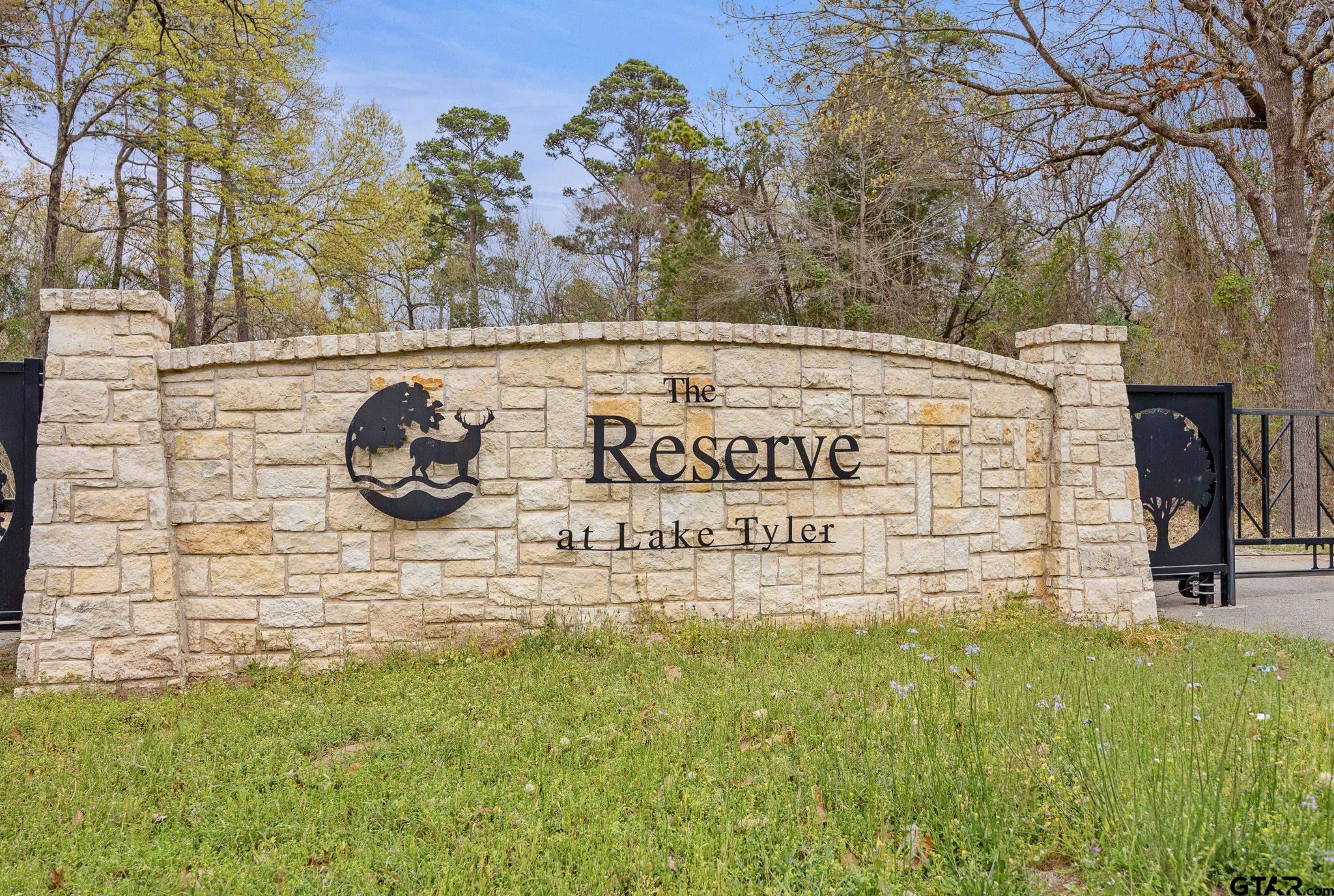 15212 Maple Leaf Court Tyler, TX 75707 - Photo 2 of 9 a sign on the side of a building