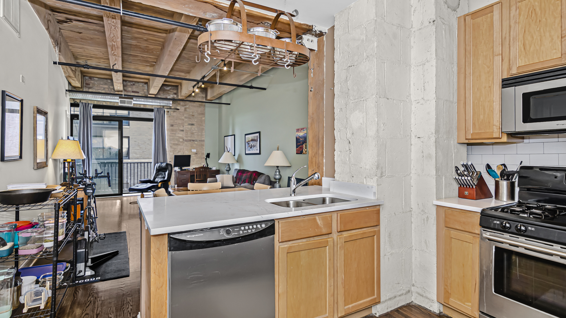 106 North Aberdeen Street, Unit 4G Chicago, IL 60607 - Photo 11 of 22 a kitchen with a sink appliances and cabinets