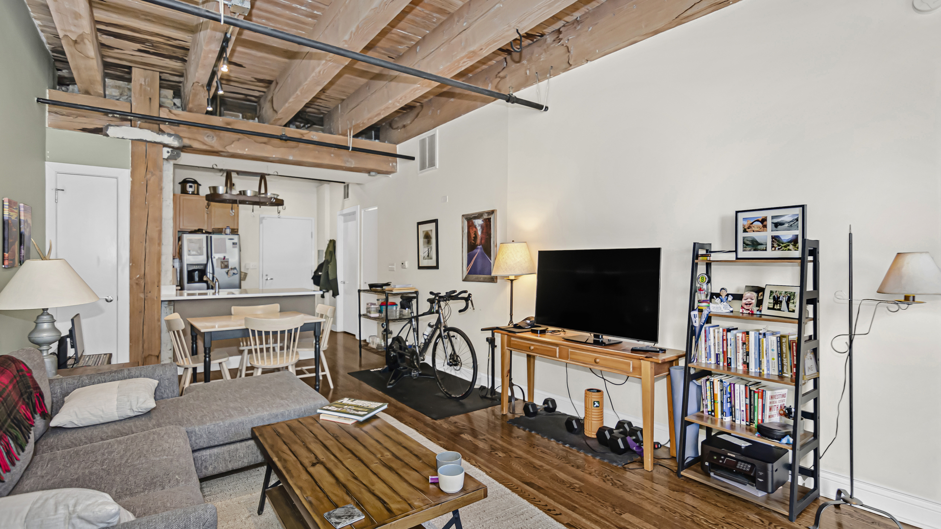 106 North Aberdeen Street, Unit 4G Chicago, IL 60607 - Photo 4 of 22 a living room with furniture and a flat screen tv