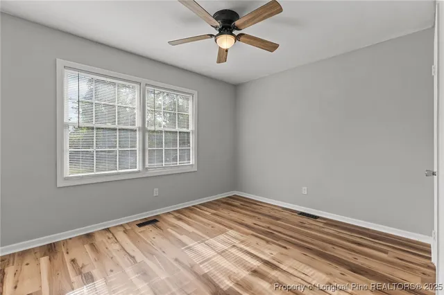 a view of a livingroom with a hardwood floor