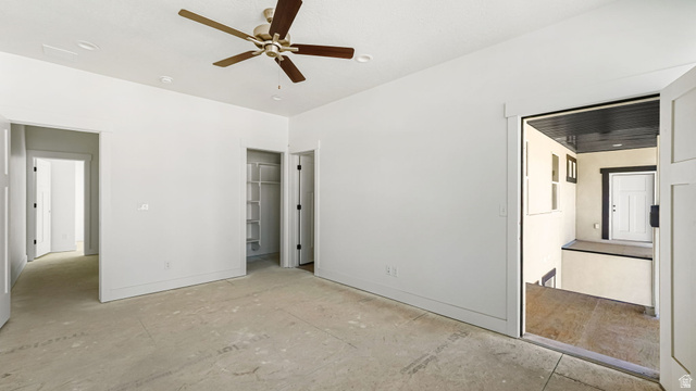 717 South Harrison Drive West Springville, UT 84663 - Photo 12 of 31 Spacious room featuring a ceiling fan with wood-finish blades, recessed lighting, and a neutral color palette