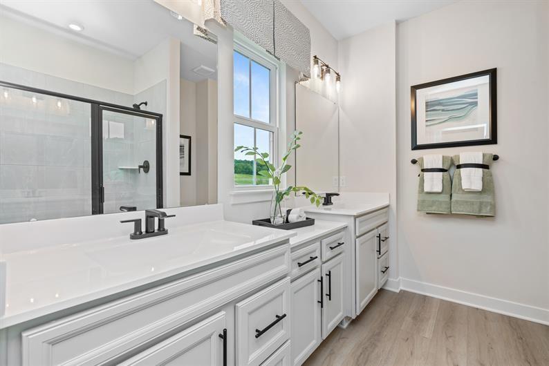 8013 Chief Way Mars, PA 16046 - Photo 11 of 18 a bathroom with double vanity sink a mirror and a shower