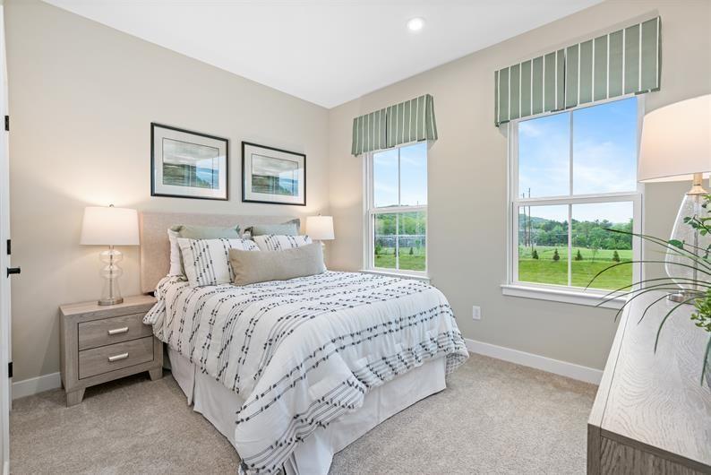 8013 Chief Way Mars, PA 16046 - Photo 13 of 18 a bedroom with a bed a couch and large window