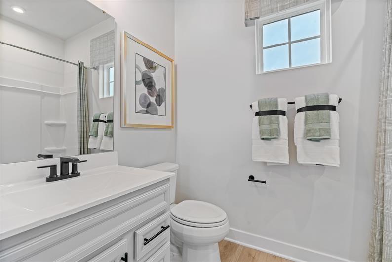 8013 Chief Way Mars, PA 16046 - Photo 15 of 18 a bathroom with a sink a toilet and mirror