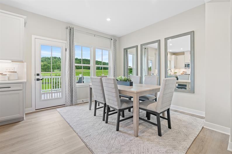 8013 Chief Way Mars, PA 16046 - Photo 6 of 18 a view of a dining room with furniture window and outside view