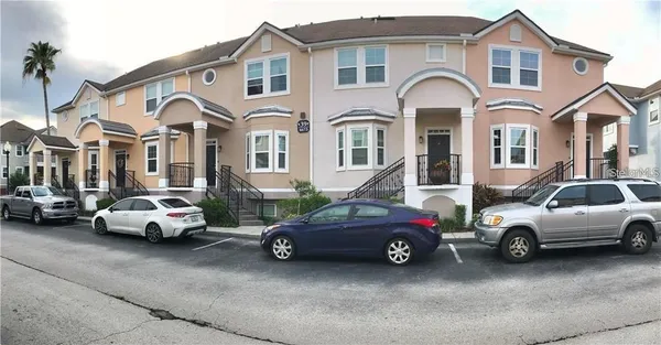 a car parked in front of a house