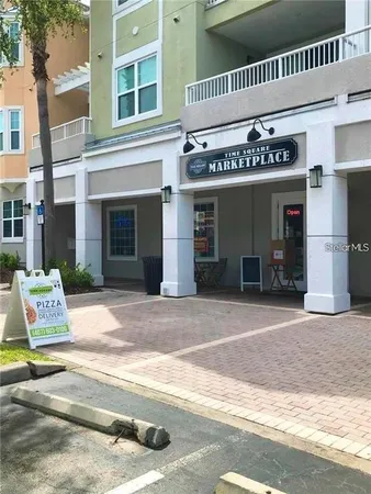 a view of a building with a sign board