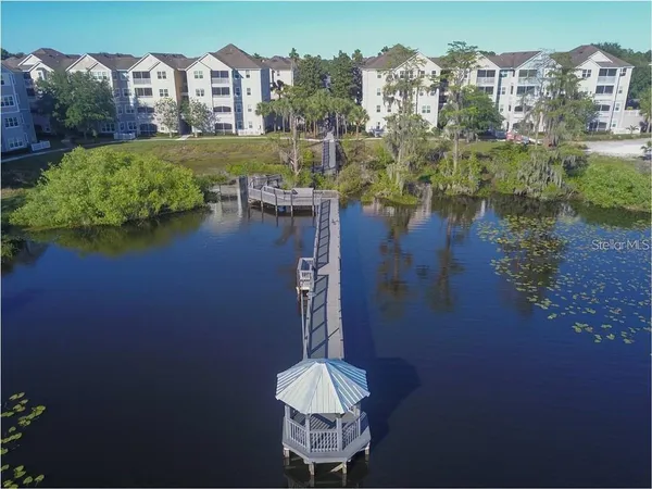 a view of a lake with a building in the background