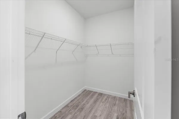 a view of a room with racks on the wall