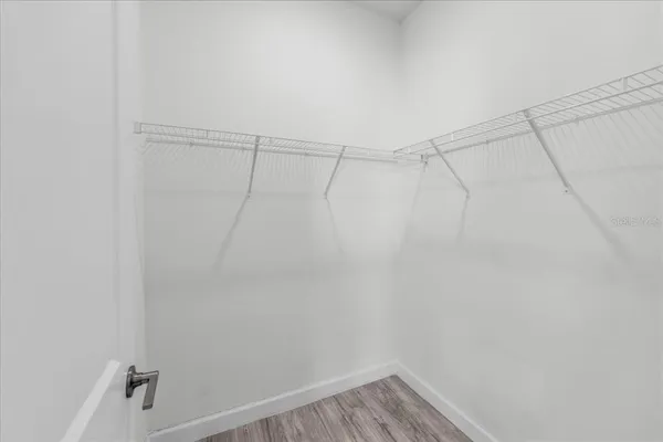 an empty room that has a window