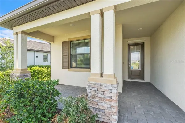 a view of swimming pool with a yard