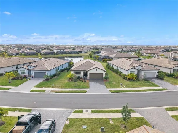 an aerial view of a building with outdoor space