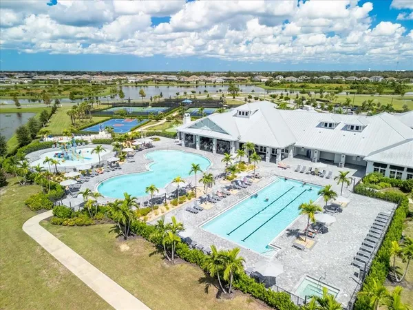 a view of a swimming pool with an ocean view