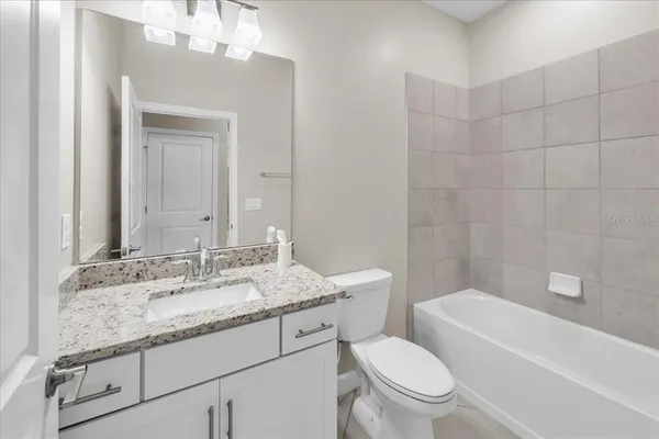 a view of a bathroom with a glass door