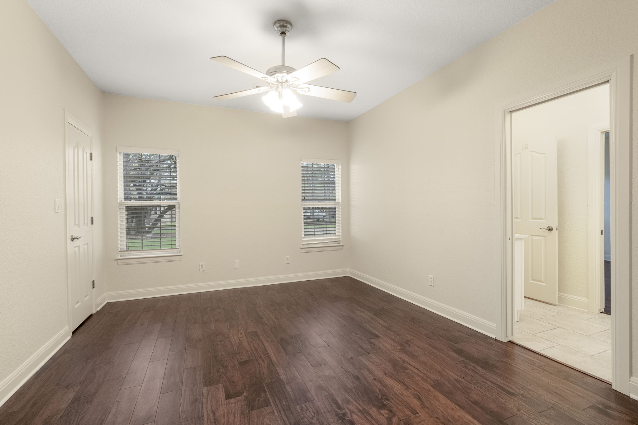 301 Goldridge Drive Georgetown, TX 78633 - Photo 26 of 40 wooden floor in an empty room with a window