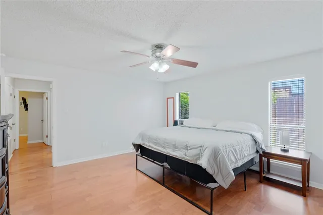a bathroom with a shower and a sink