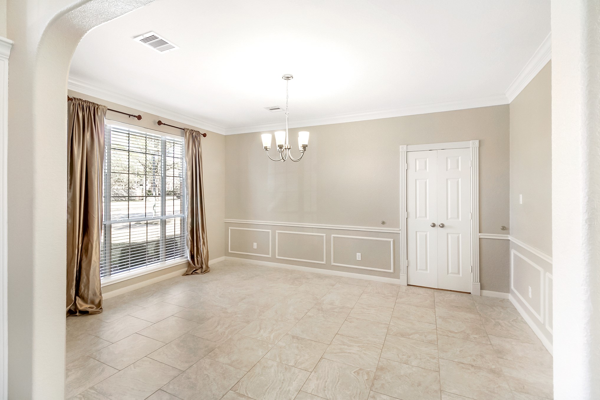 803 Chisel Point Drive Houston, TX 77094 - Photo 6 of 36 Formal dining room with double doors leading to the kitchen.