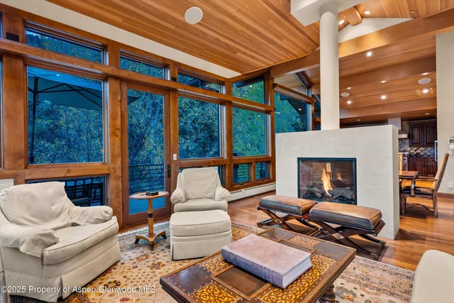a view of a patio with a table chairs and a patio