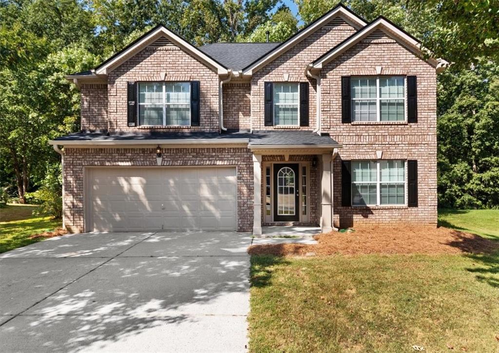 101 Randy Way Dallas, GA 30132 - Photo 1 of 1 a front view of a house with a yard