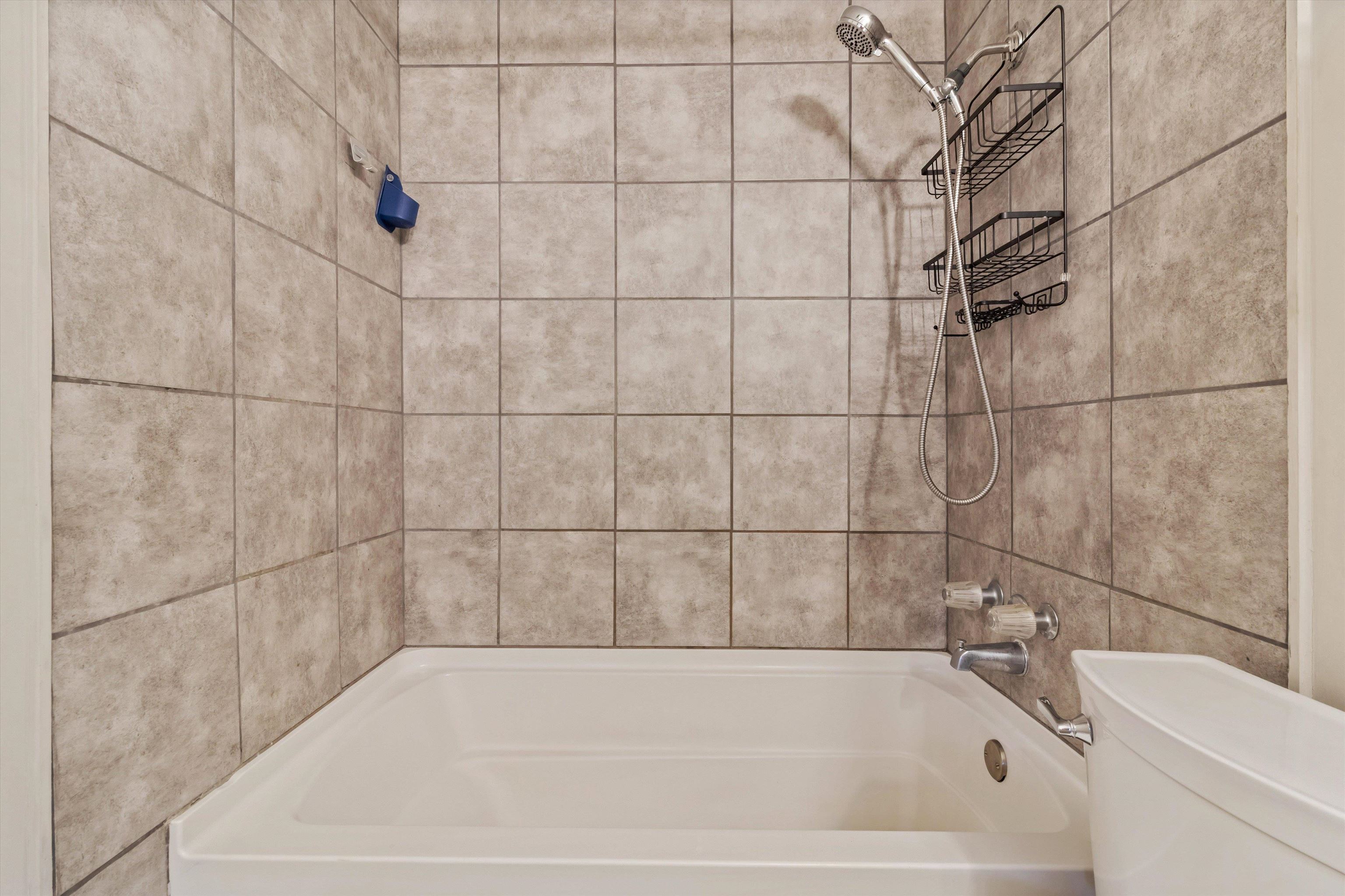 517 Malboro Road Memphis, TN 38120 - Photo 16 of 25 Bathroom featuring shower combination and toilet