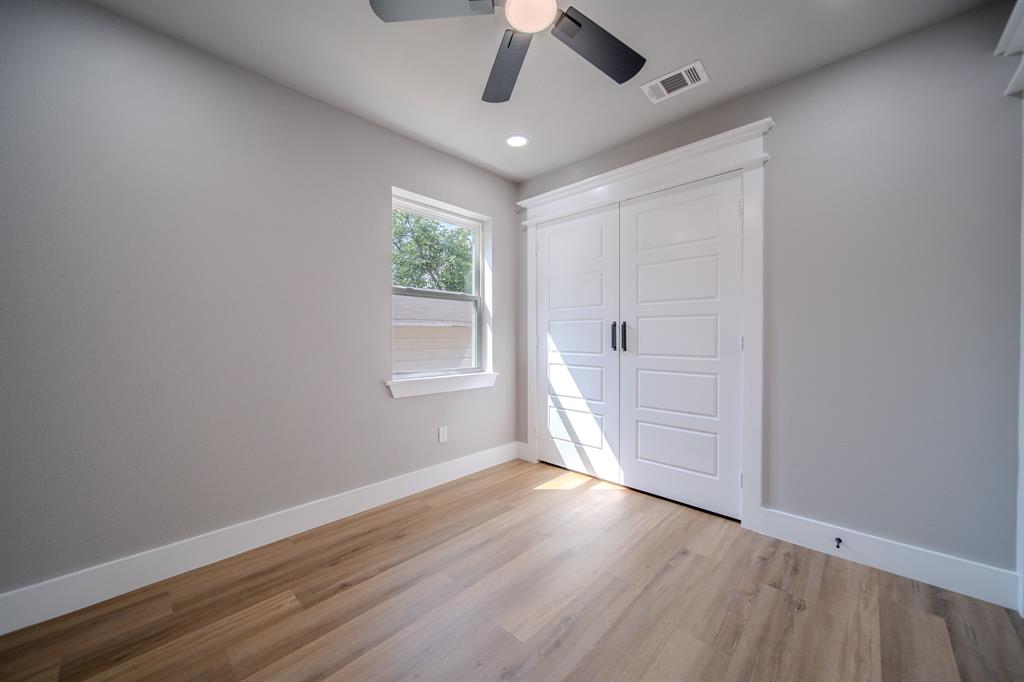 6320 Old Ox Road Dallas, TX 75241 - Photo 9 of 17 Wood-finish flooring, white trim, recessed lighting, and a ceiling fan with light fixture