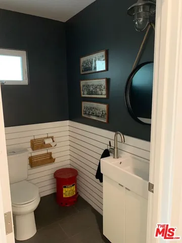 a bathroom with a sink and a toilet
