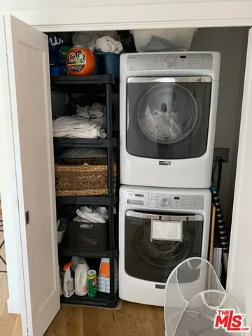 a utility room with washer and dryer