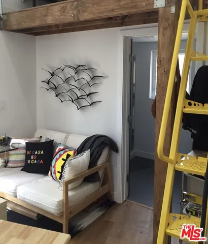 a bedroom with a bed and furniture