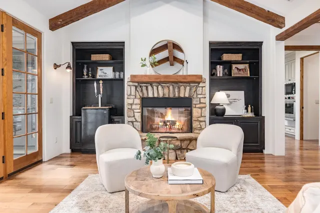 a kitchen with stainless steel appliances granite countertop a stove and a sink