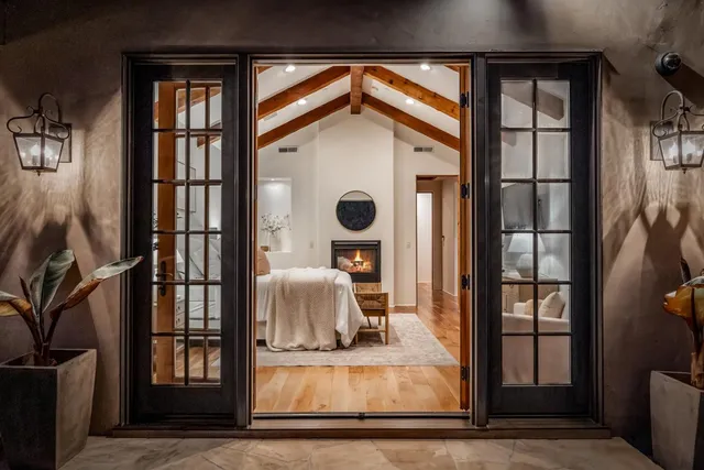 a outdoor living space with furniture and a fireplace