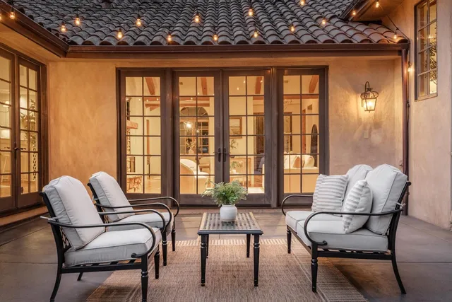 a open kitchen with stainless steel appliances granite countertop a stove and a sink